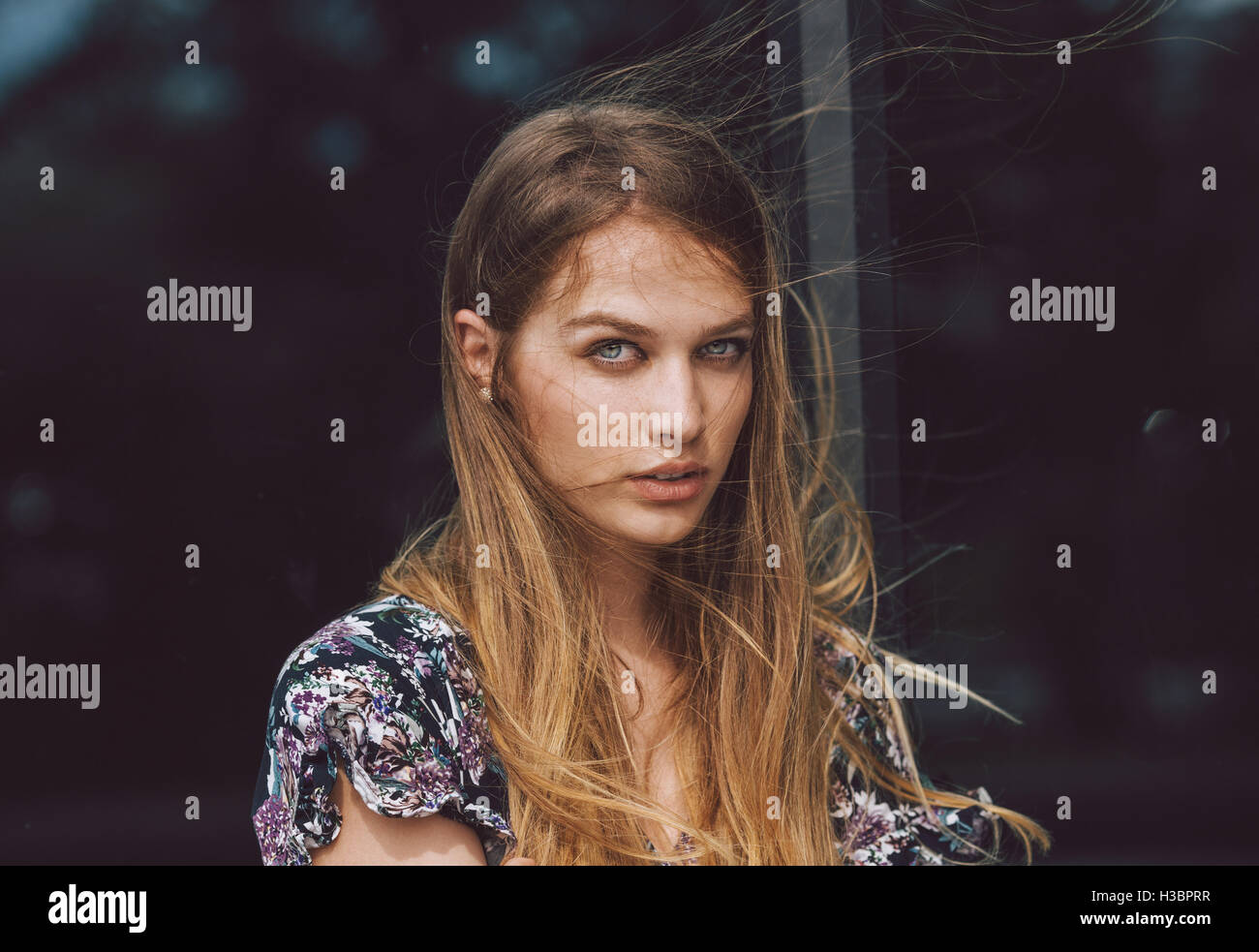 Portrait of a woman with wind in her hair Stock Photo