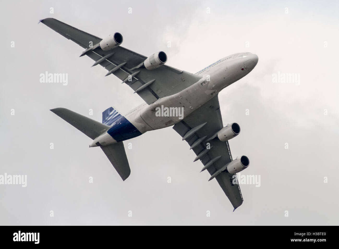 An Airbus A380 four-engine jet airliner performs at the Farnborough Air Show 2014. Stock Photo