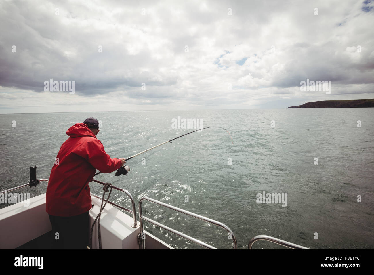 Fisherman in boat fishing hi-res stock photography and images - Alamy