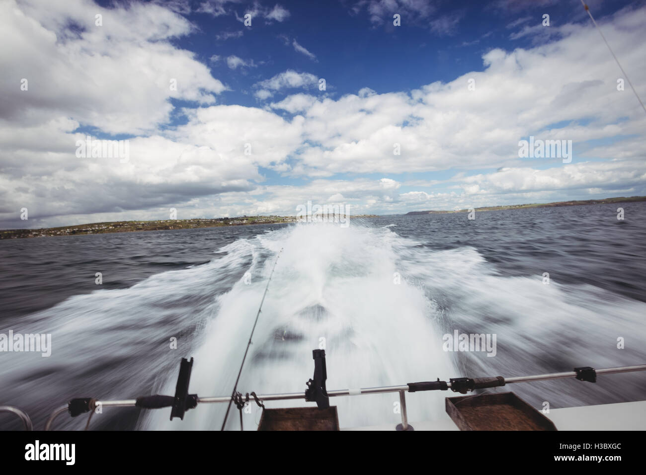 Fishing boat sailing in sea Stock Photo
