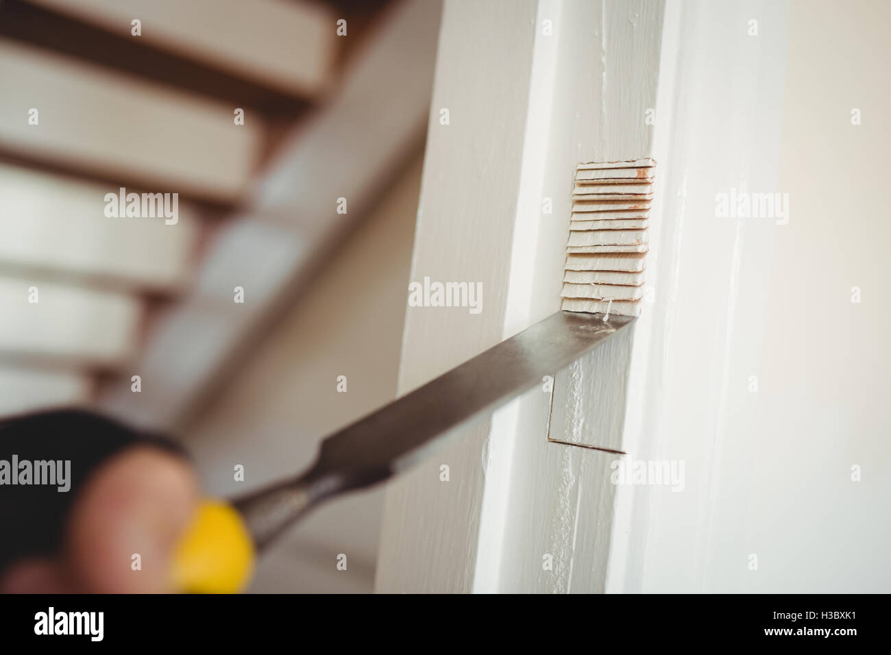 Carpenter working on a door frame Stock Photo Alamy