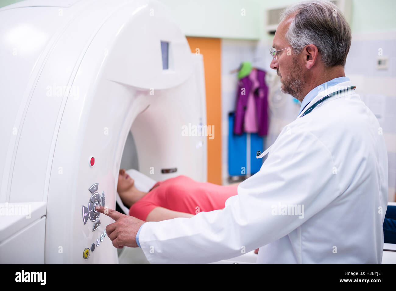 Patient entering mri scan machine Stock Photo