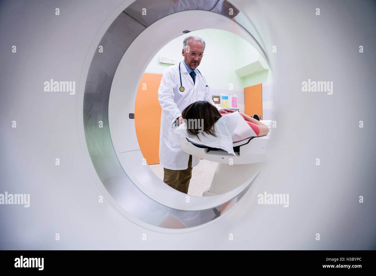 Patient entering mri scan machine Stock Photo