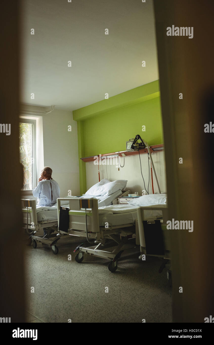 Man on hospital bed hi-res stock photography and images - Alamy