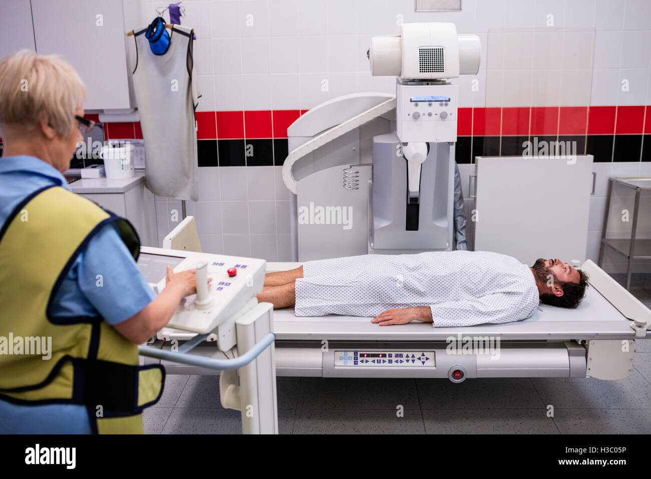 Male patient going through xray test Stock Photo Alamy