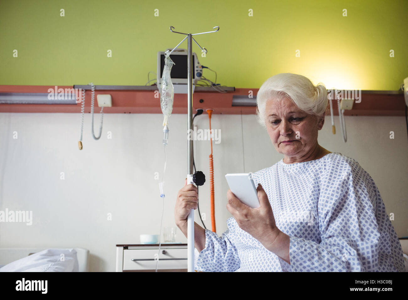 Senior woman looking at mobile phone Stock Photo