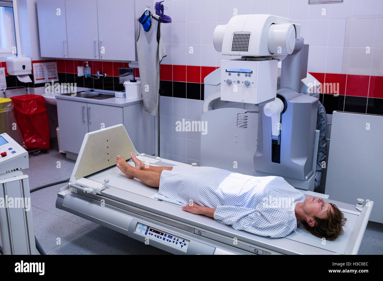 Female patient going through xray test Stock Photo Alamy