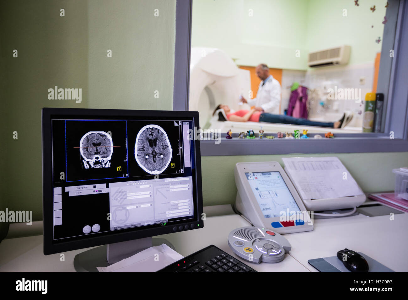 Digital brain scan on computer monitor Stock Photo