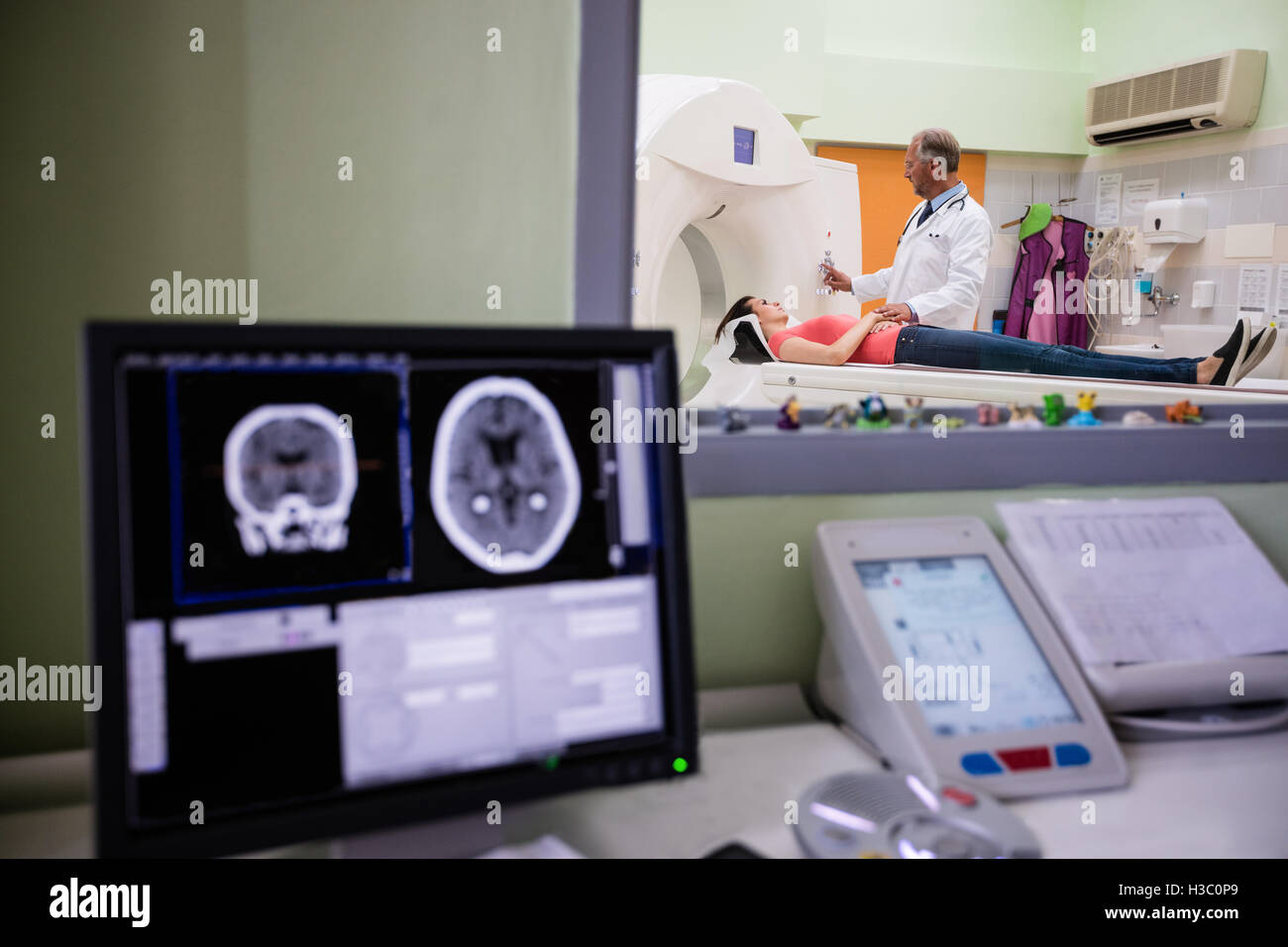 Digital brain scan on computer monitor Stock Photo