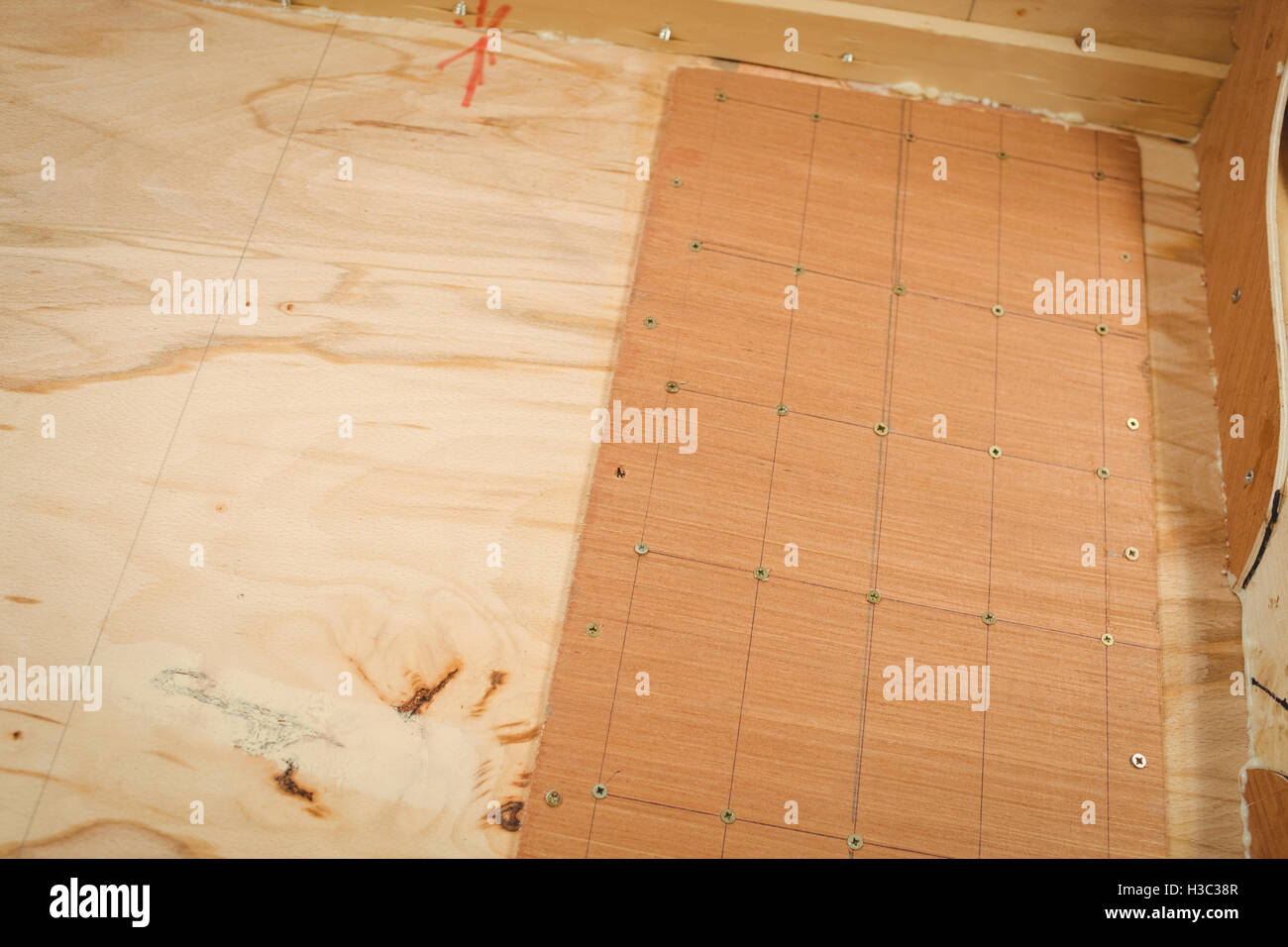 Wooden boat under construction Stock Photo