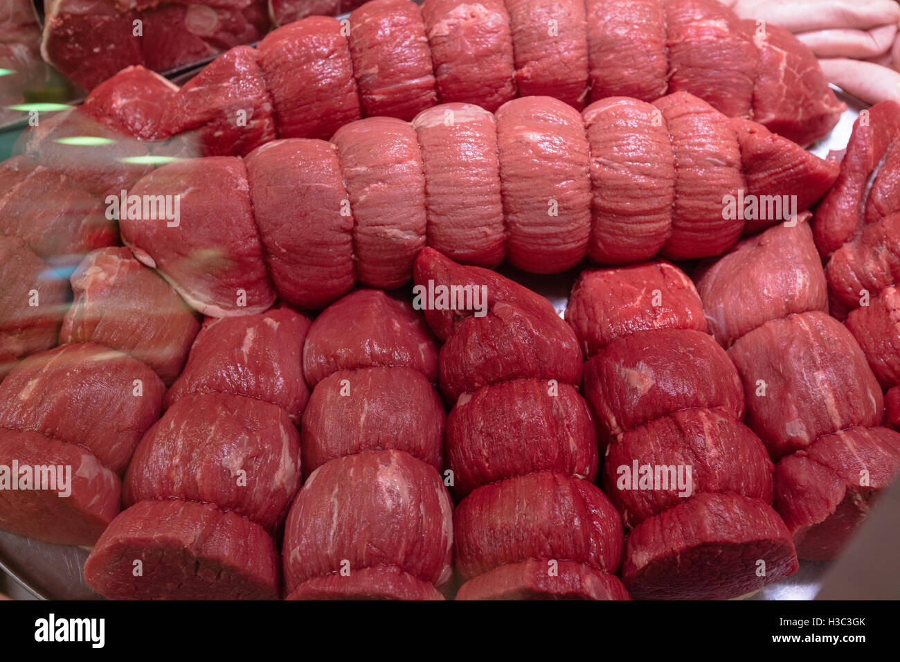 Variety of marinated meat at display counter Stock Photo Alamy