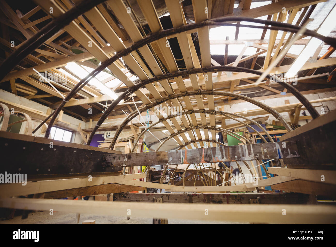 Wooden boat under construction Stock Photo