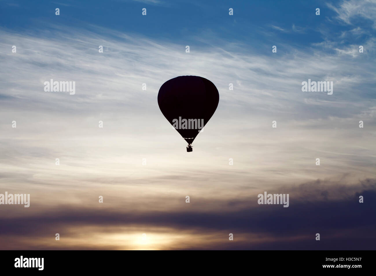 Balloon on a background of the beautiful sky and sunset, lifestyle, freedom and inspiration Stock Photo