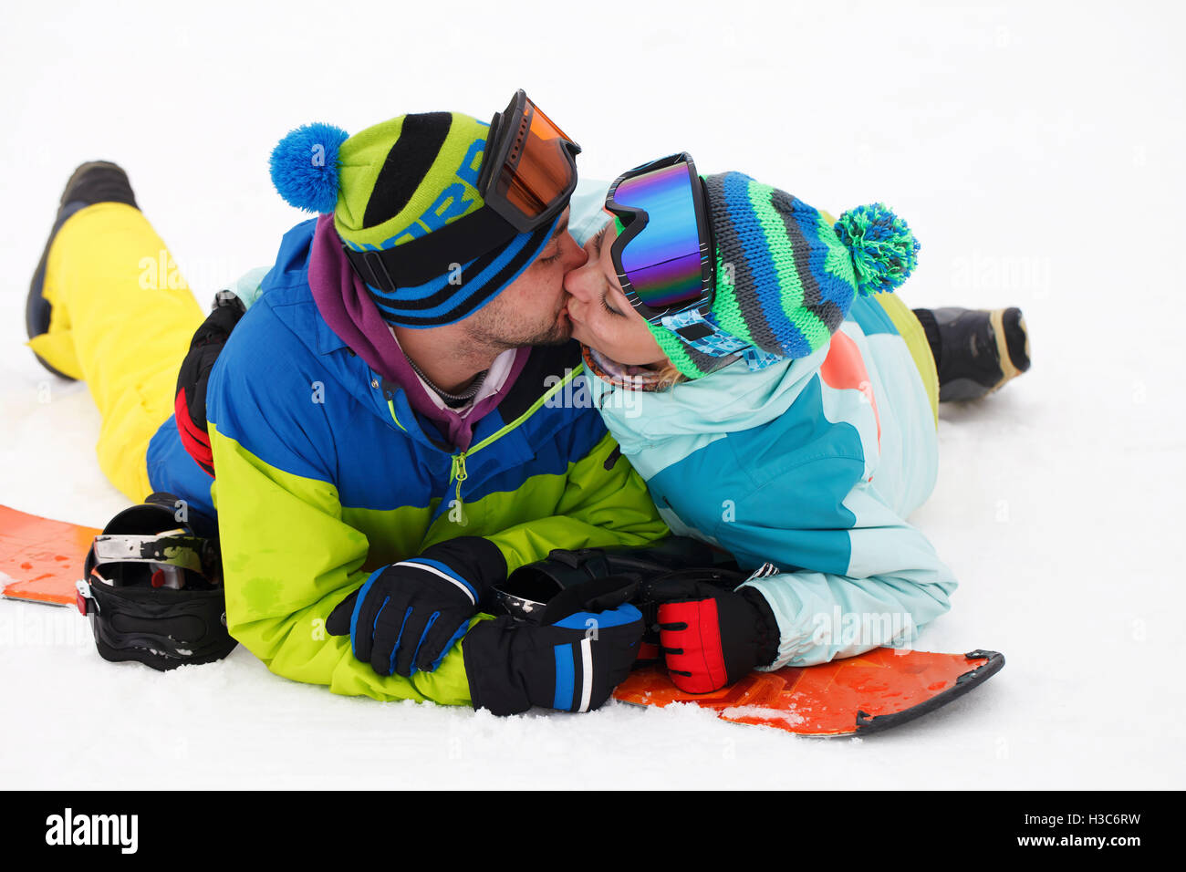 young couple snowboarders rejoice and be glad active recreation Stock Photo