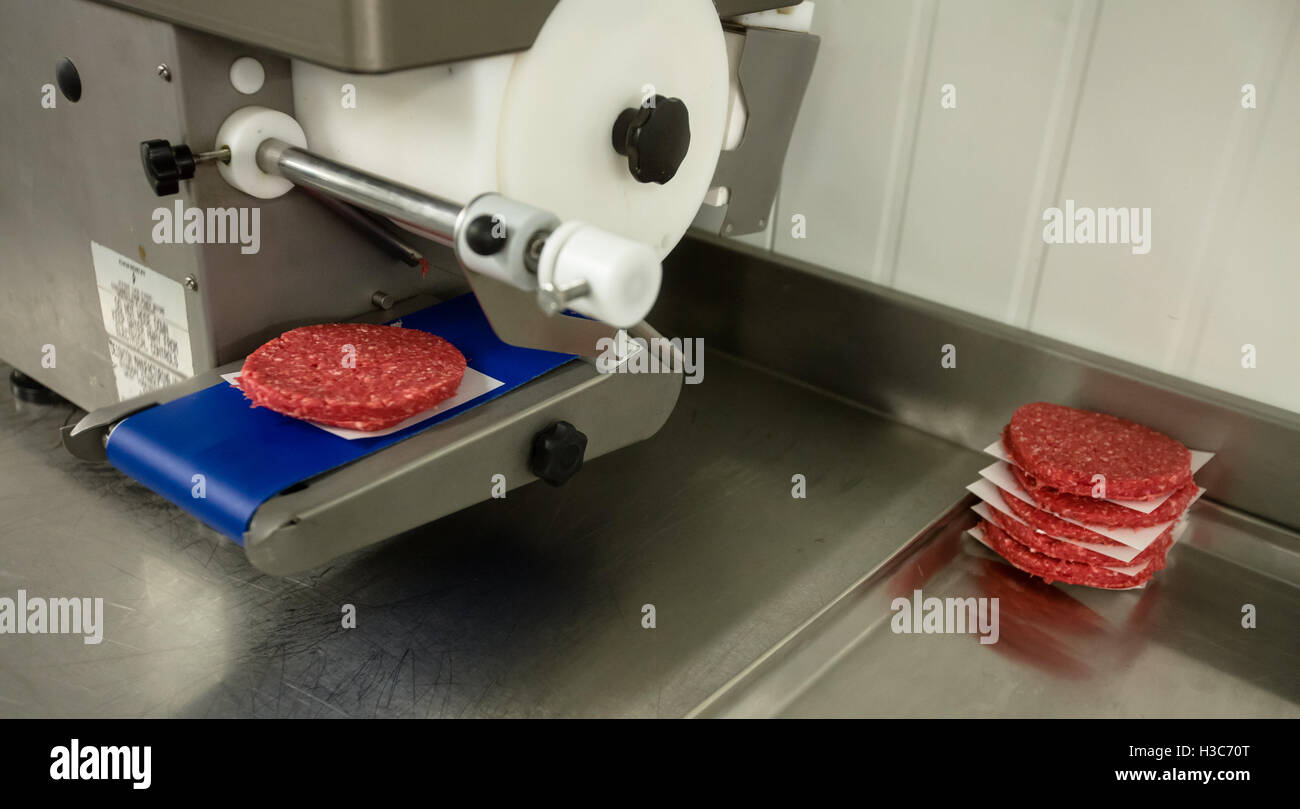 Preparation of raw hamburger patties Stock Photo - Alamy
