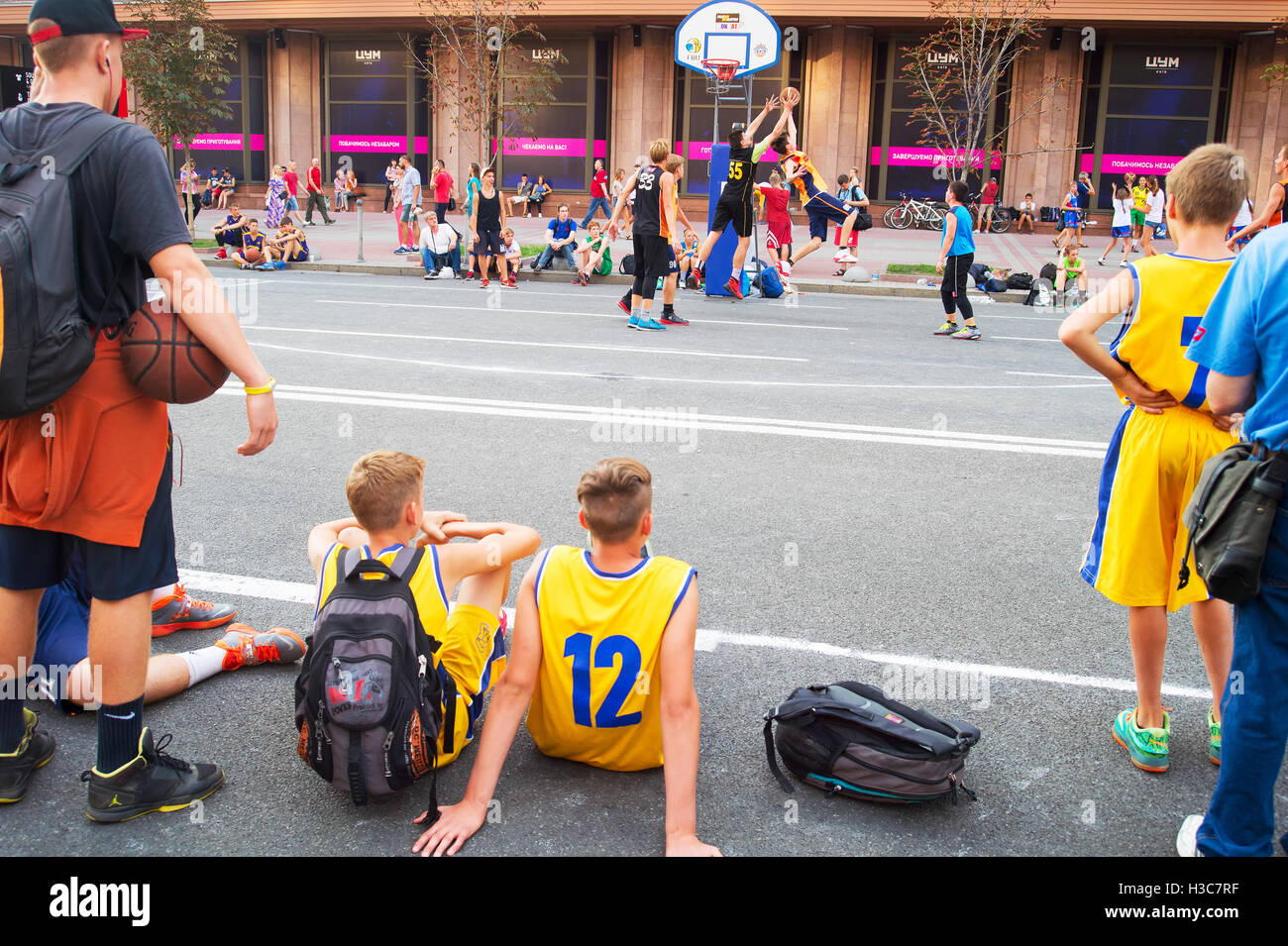 Teenagers playing basketball during the 3x3 Ukrainian Streetball Championship. Stock Photo