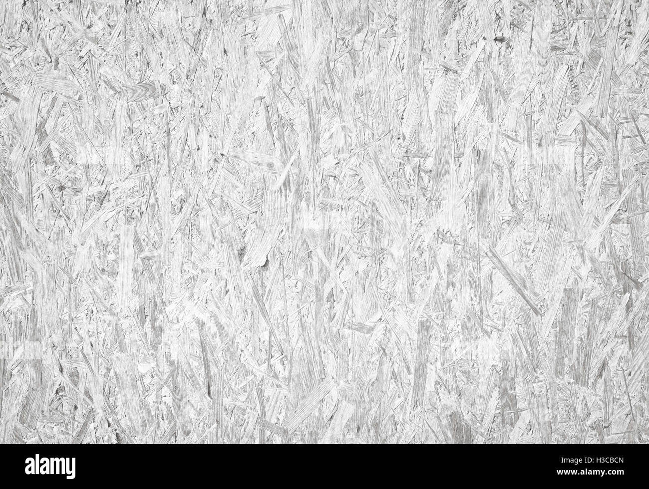 White recycled hardboard. Chipboard wall. Wooden texture Stock Photo