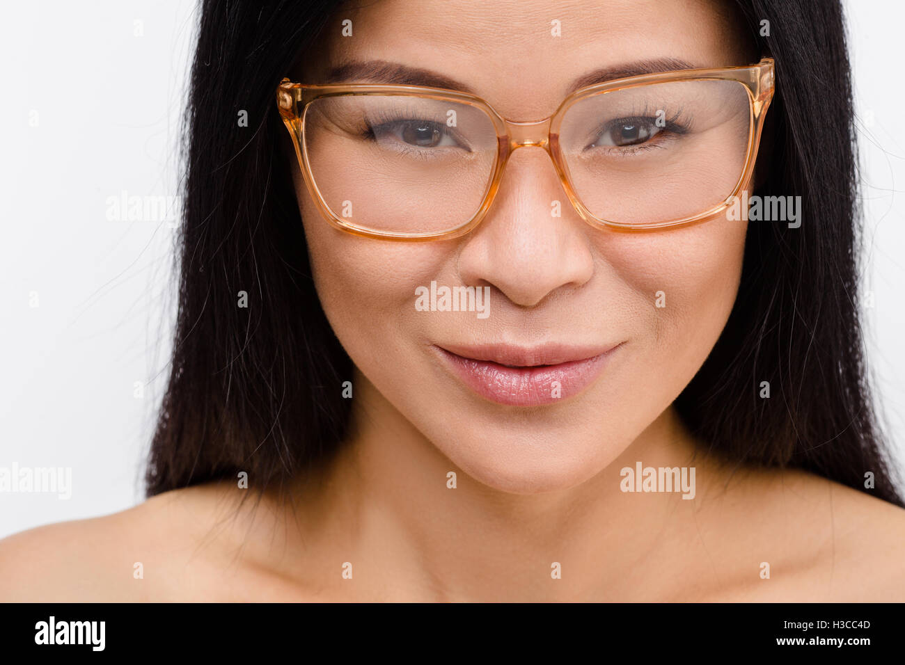 Beautiful Korean woman in glasses in studio Stock Photo Alamy