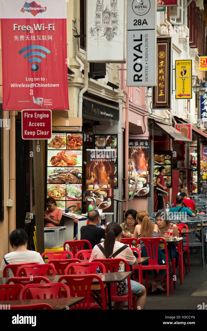 Singapore, Chinatown, Smith (Food) Street, restaurant tables in street Stock Photo