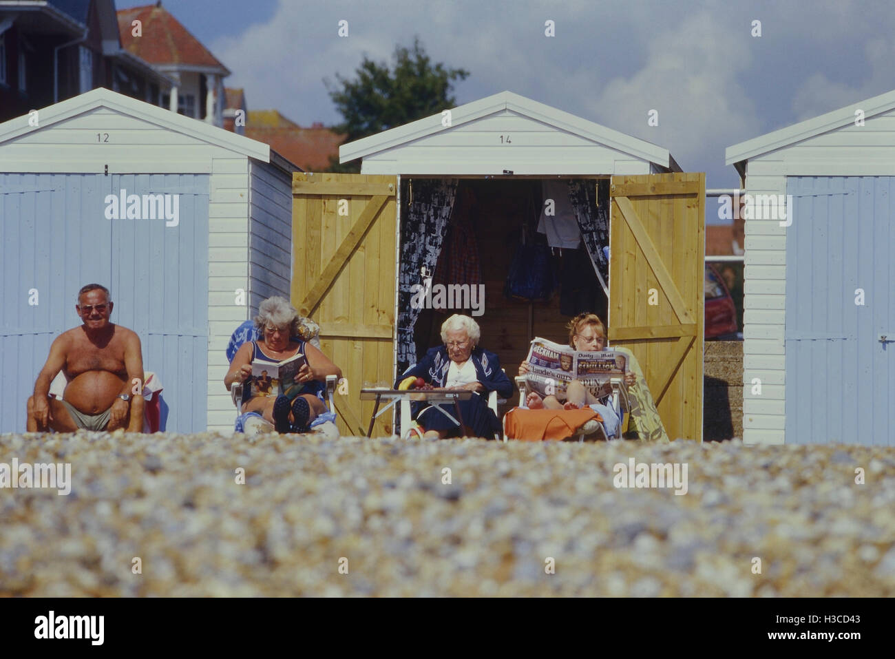 Beach hut owners. Bexhill. East Sussex. England. UK Stock Photo