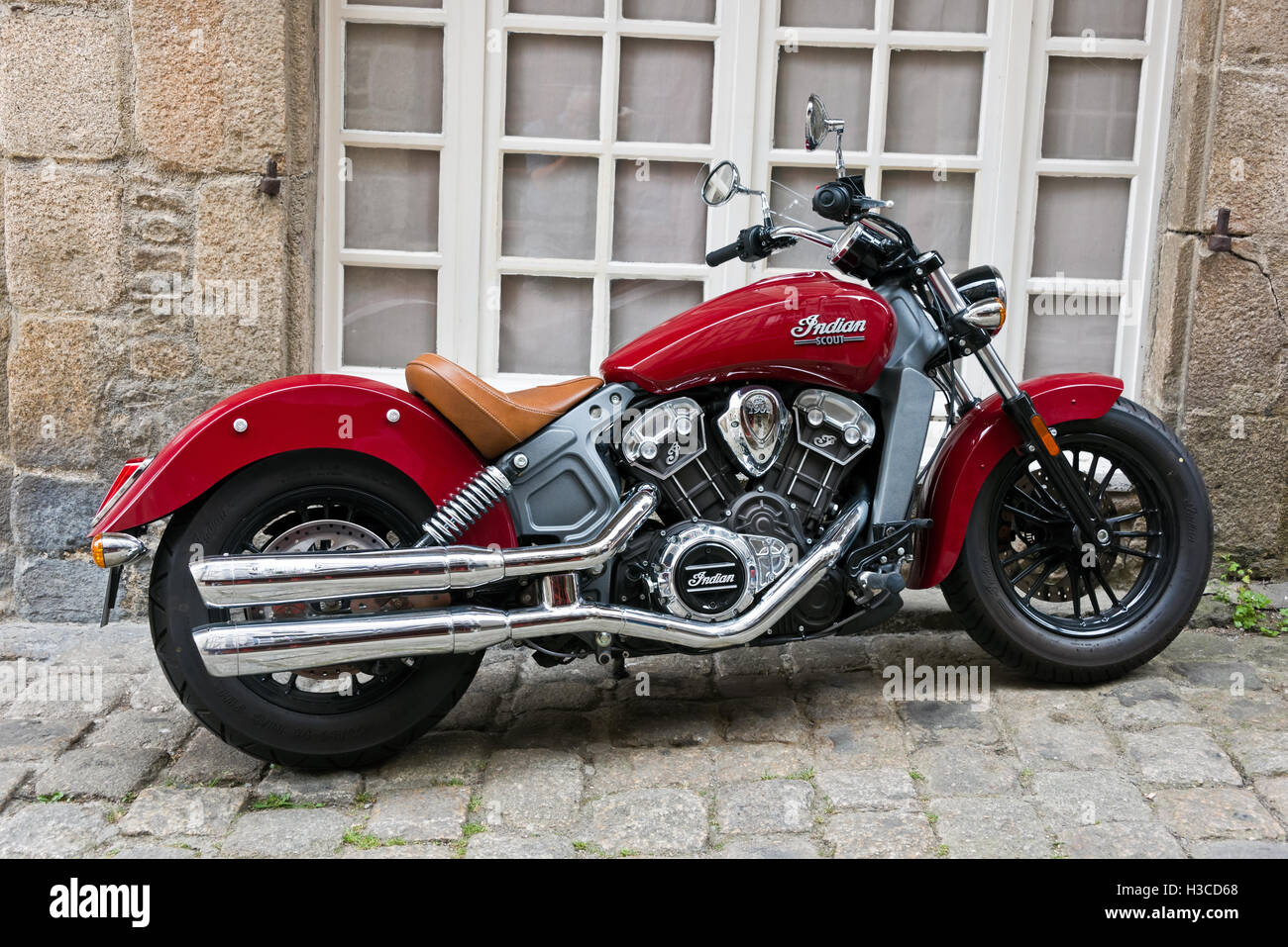 Indian motor bike by stone wall and window Stock Photo Alamy