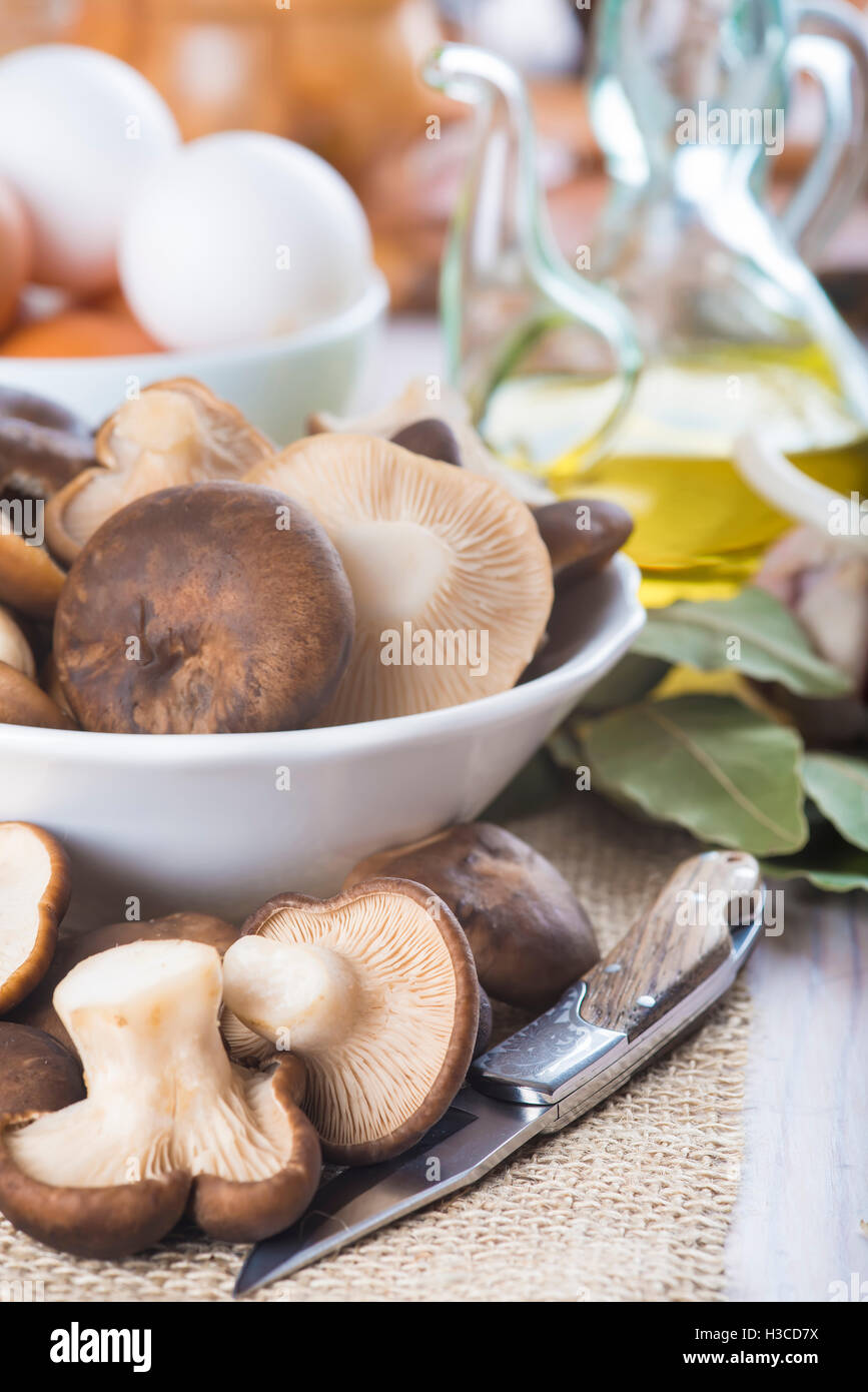 King trumpet mushrooms and ingredients for cooking on the table of the