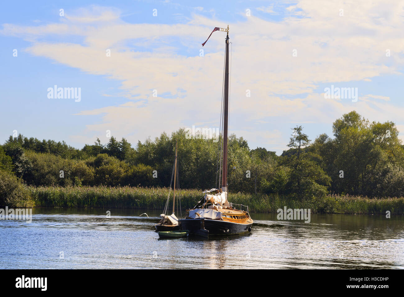 Traditional Norfolk Wherry boat on Wroxham Broad on the Norfolk Broads ...