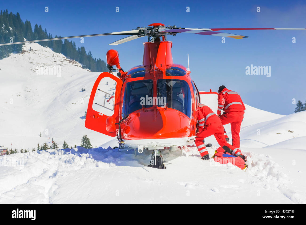 Rescue helicopter team prepares for emergency response Stock Photo