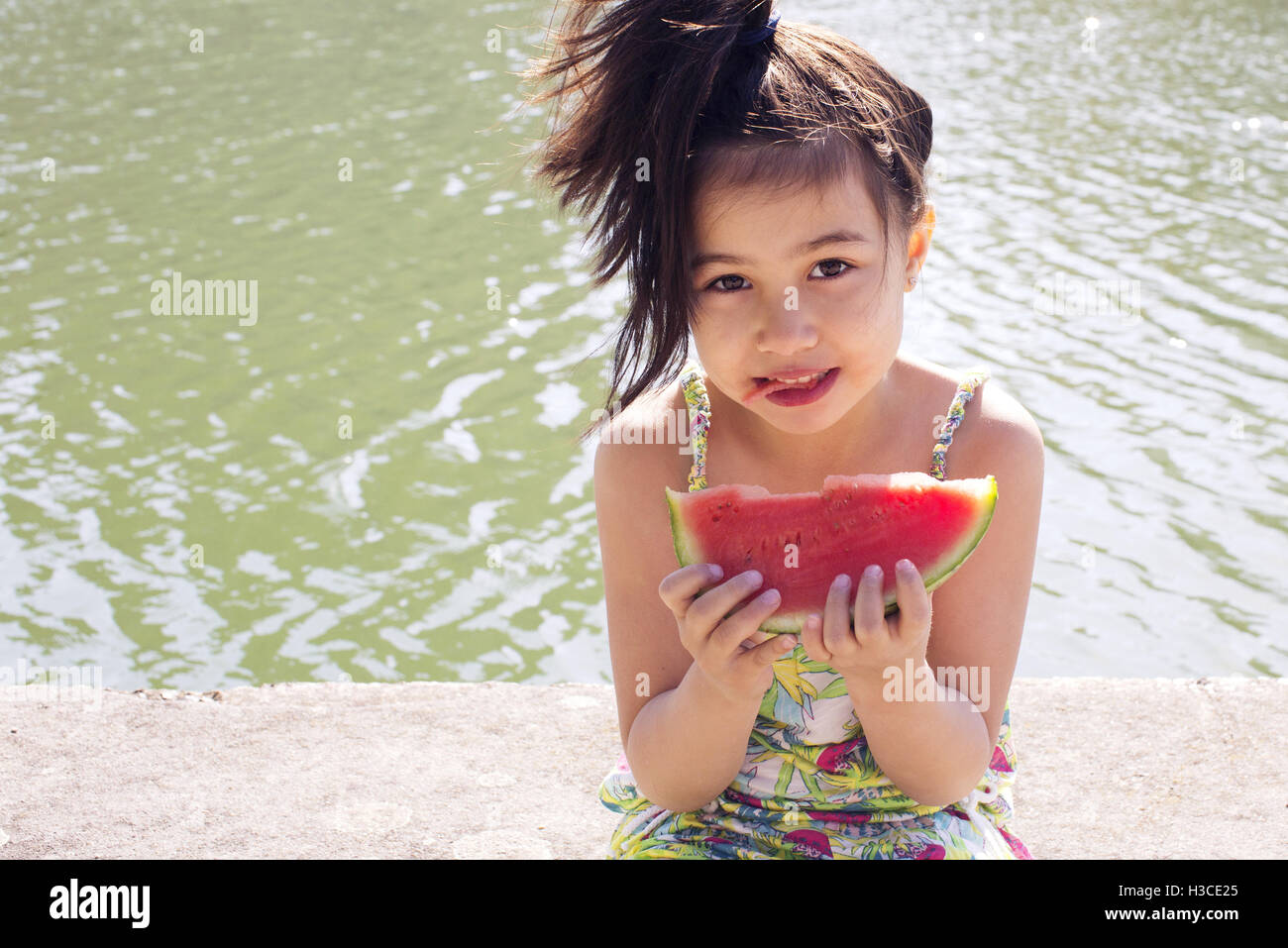 Girl eating watermelon, portrait Stock Photo
