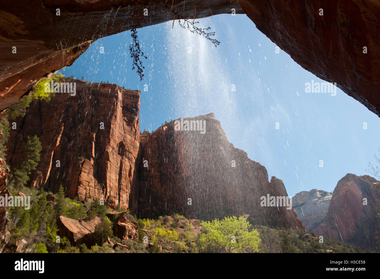 Cave behind a waterfall hi-res stock photography and images - Alamy