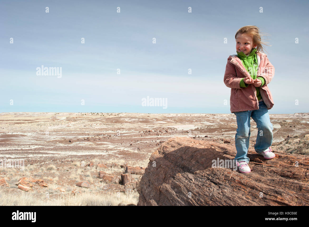 Girl visiting Petrified National Forest in Arizona, USA Stock Photo