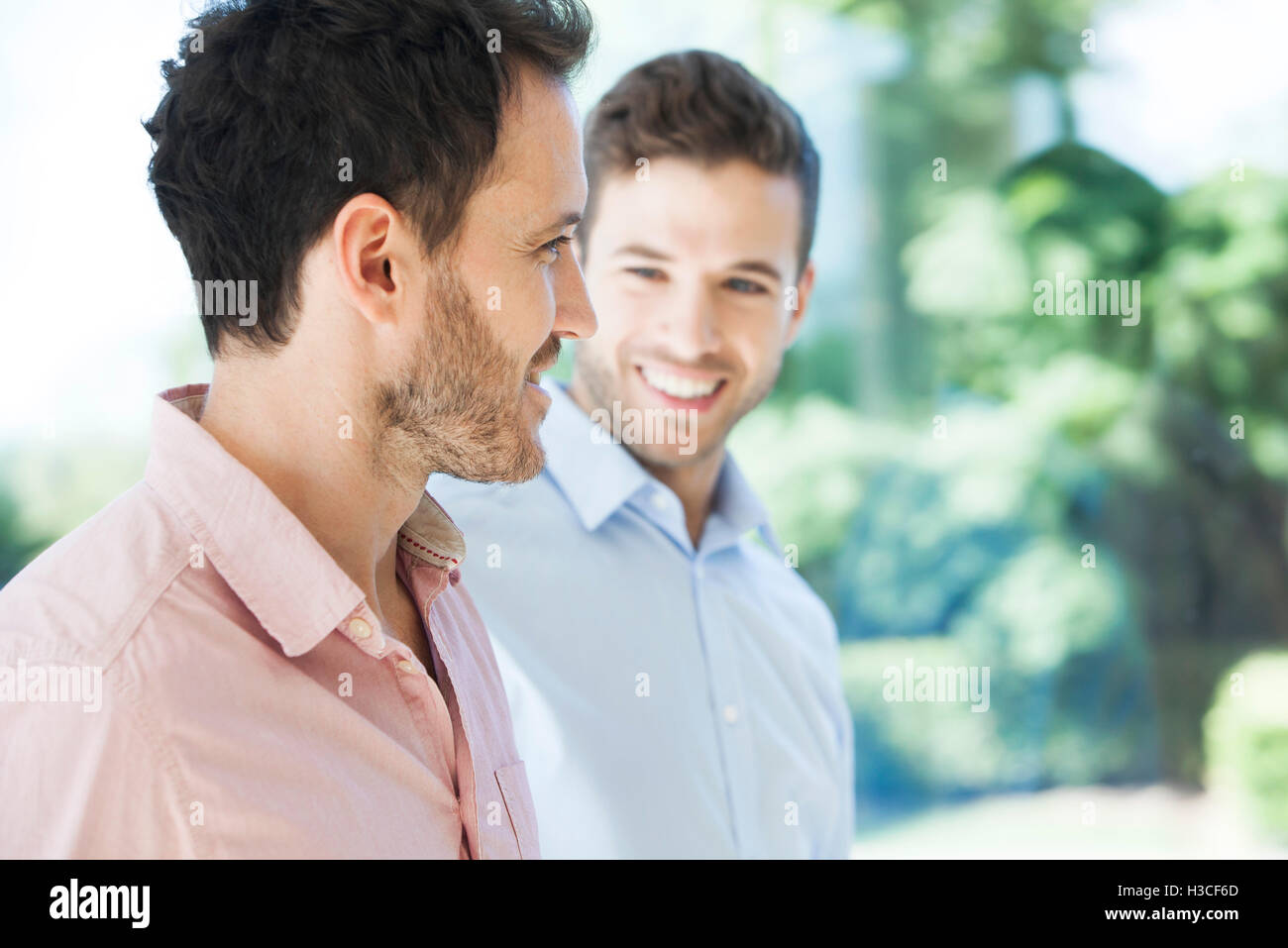 Business colleagues chatting Stock Photo - Alamy