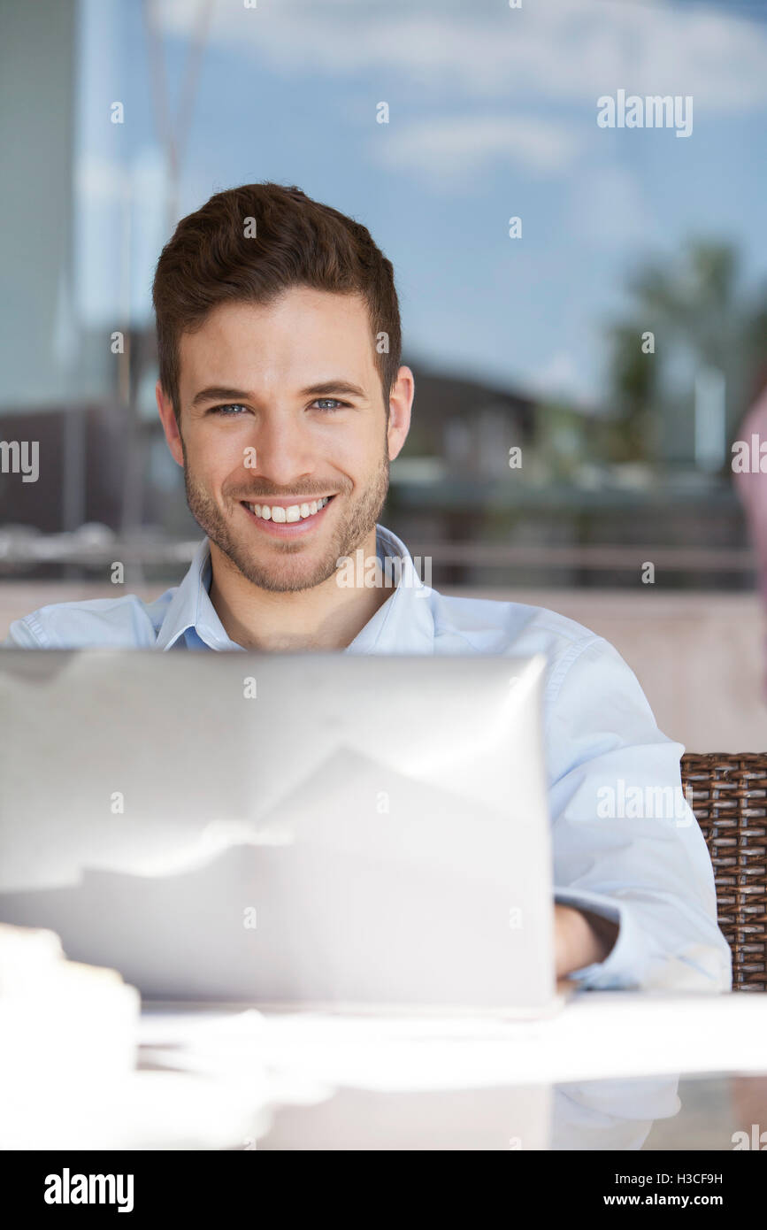 Man using laptop computer Stock Photo