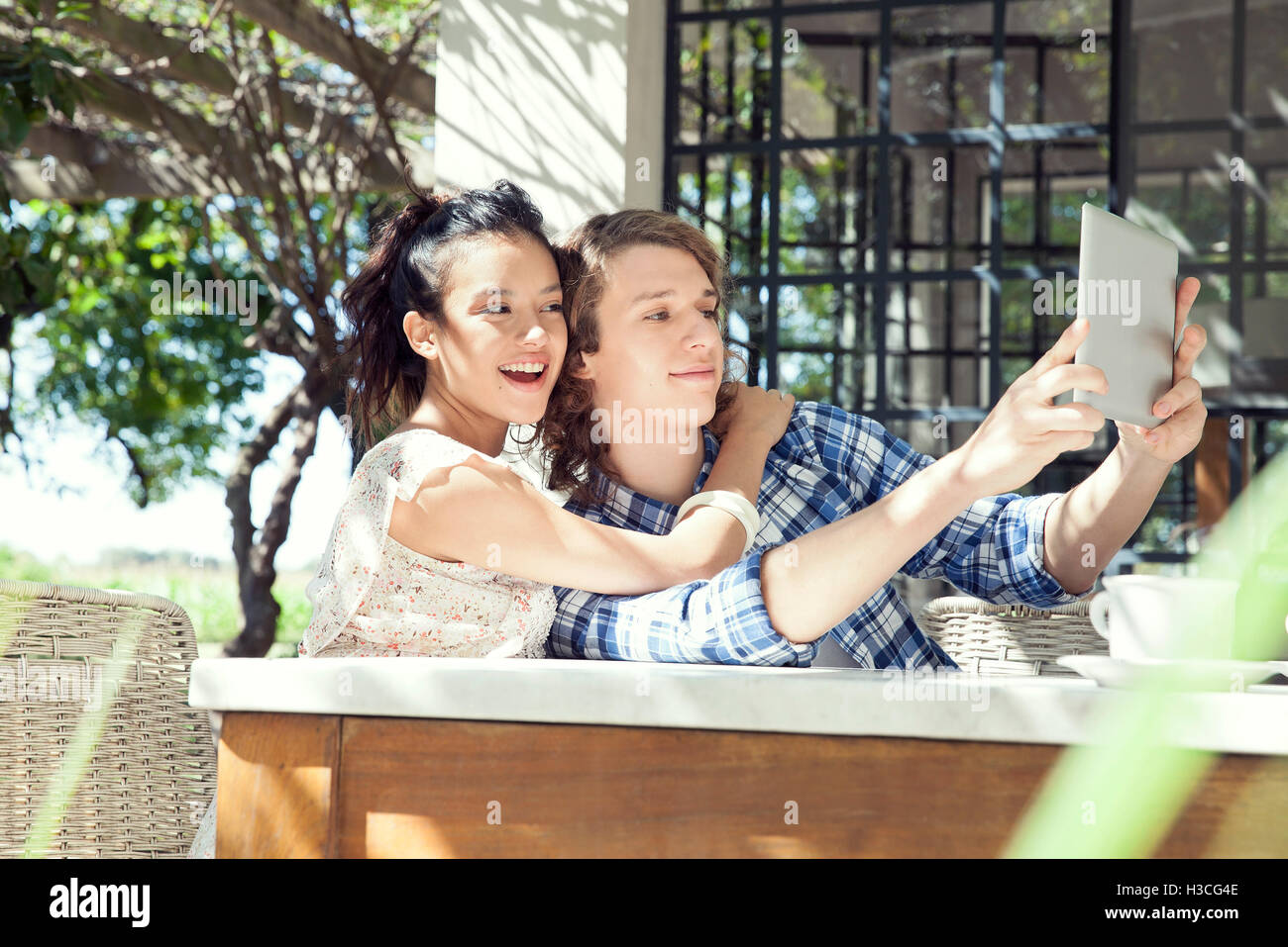 Young couple taking selfie with digital tablet Stock Photo