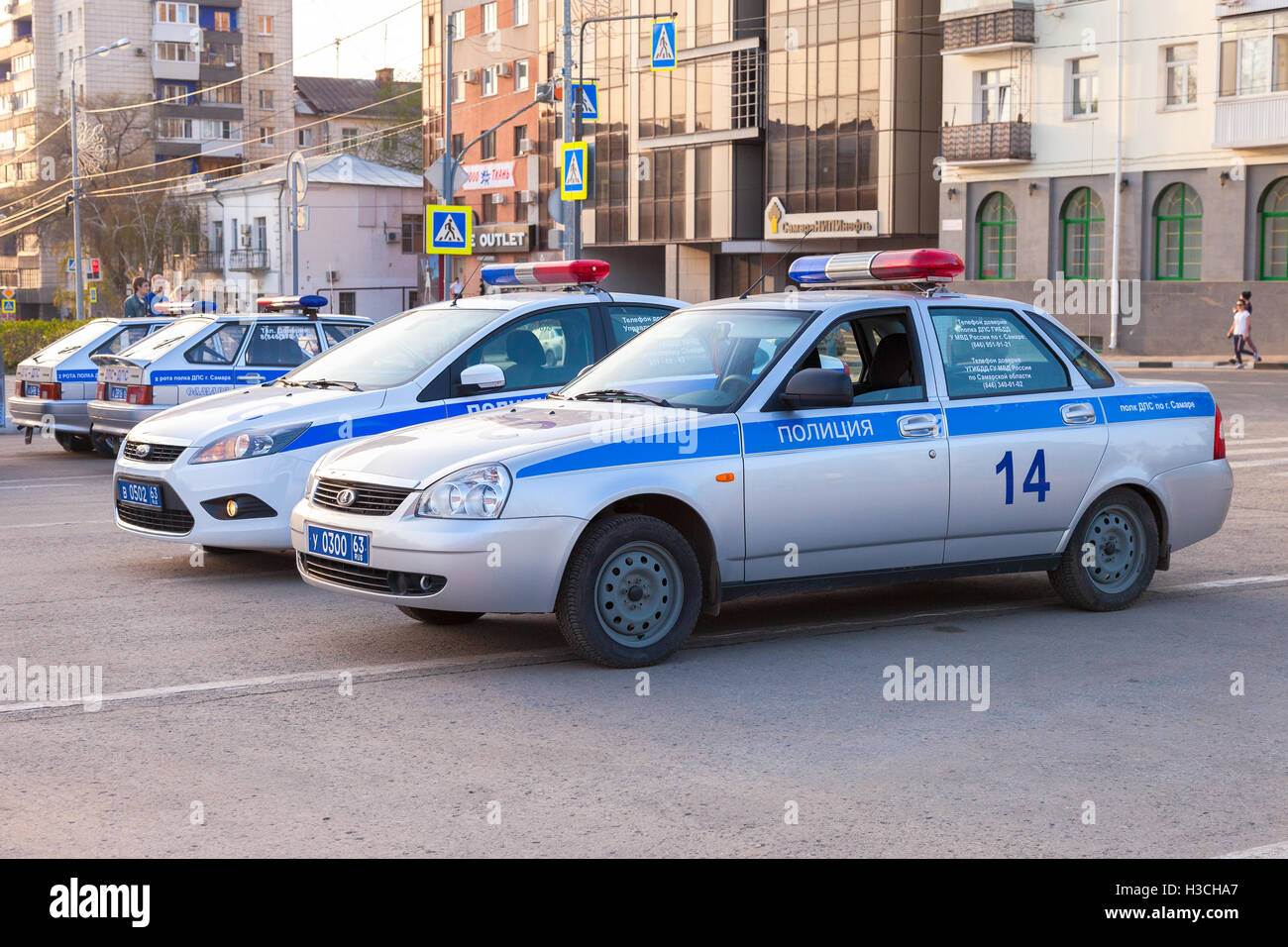 Russian police patrol cars of the State Automobile Inspectorate parked on the city street Stock Photo