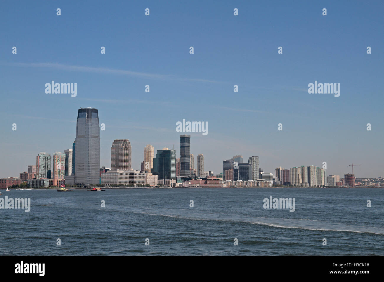 Jersey City in New Jersey viewed from a Staten Island ferry, Upper New York Bay, New Jersey, United States. Stock Photo