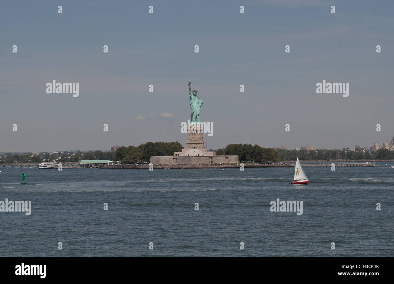 The Statue of Liberty in Upper New York Bay as viewed from a Staten Island ferry, New York, United States. Stock Photo