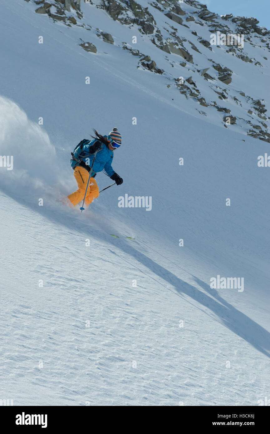 Freeride skier on a fresh powder slope Stock Photo Alamy