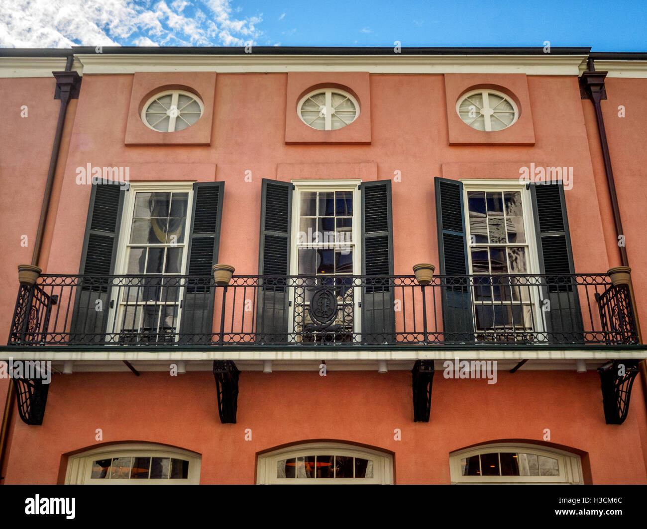 Three Windows and a Balcony in the French Quarter New Orleans Stock