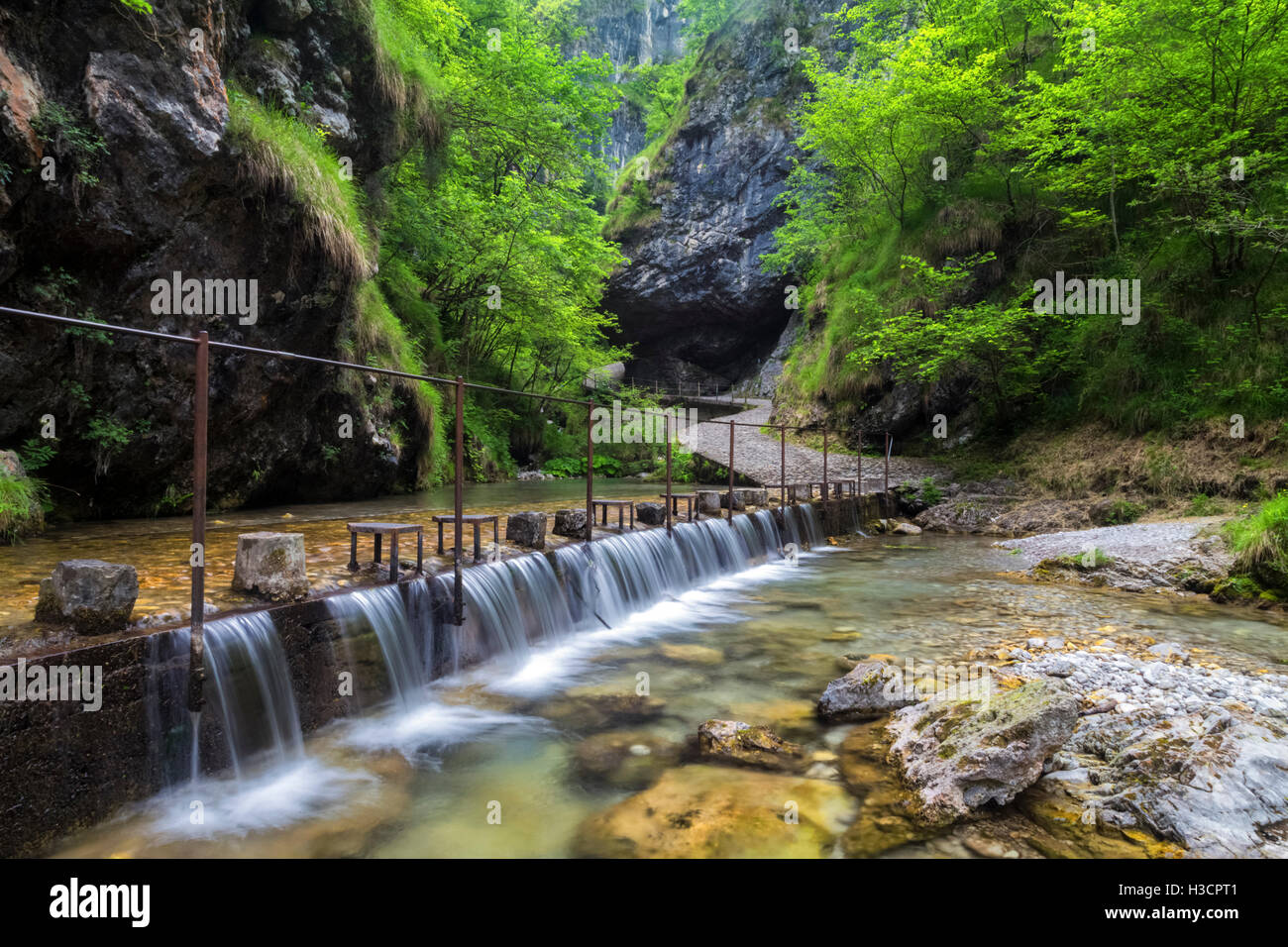 Waterfalls on the trail along val Vertova, Vertova, Val Seriana, Bergamo province, Lombardy, Italy. Stock Photo
