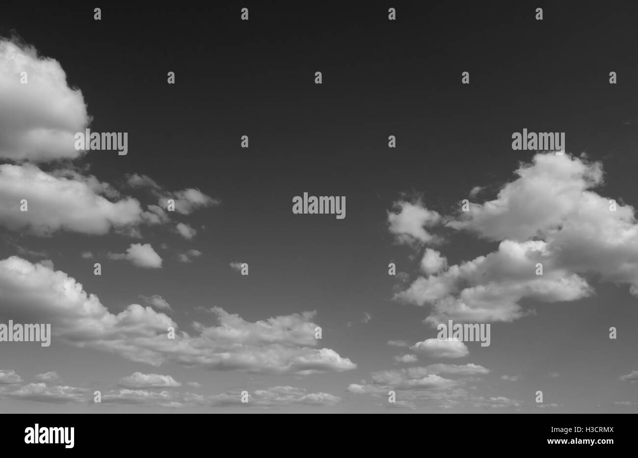 White gray fluffy clouds Black and White Stock Photos & Images - Alamy