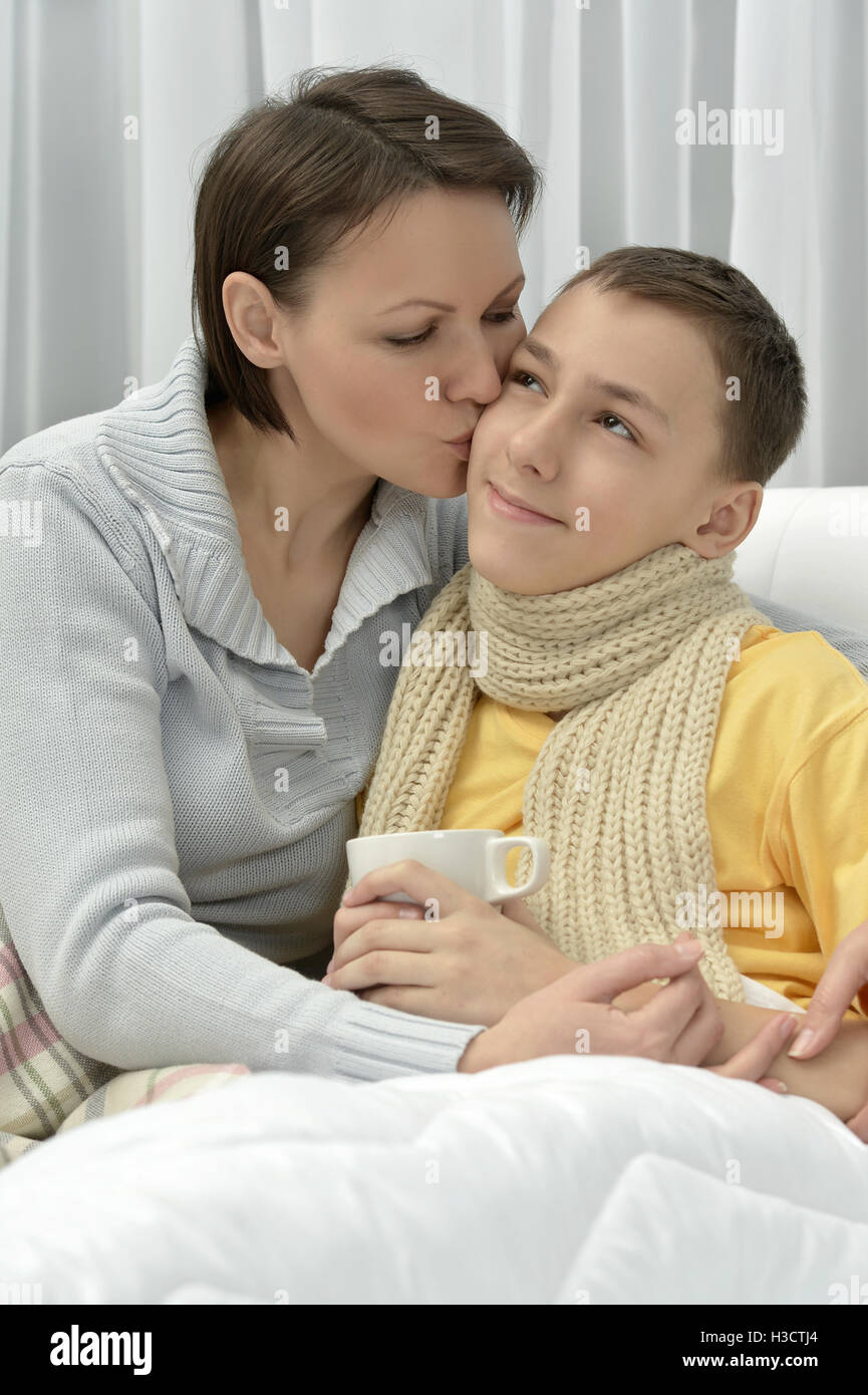 Young mother and ill son Stock Photo