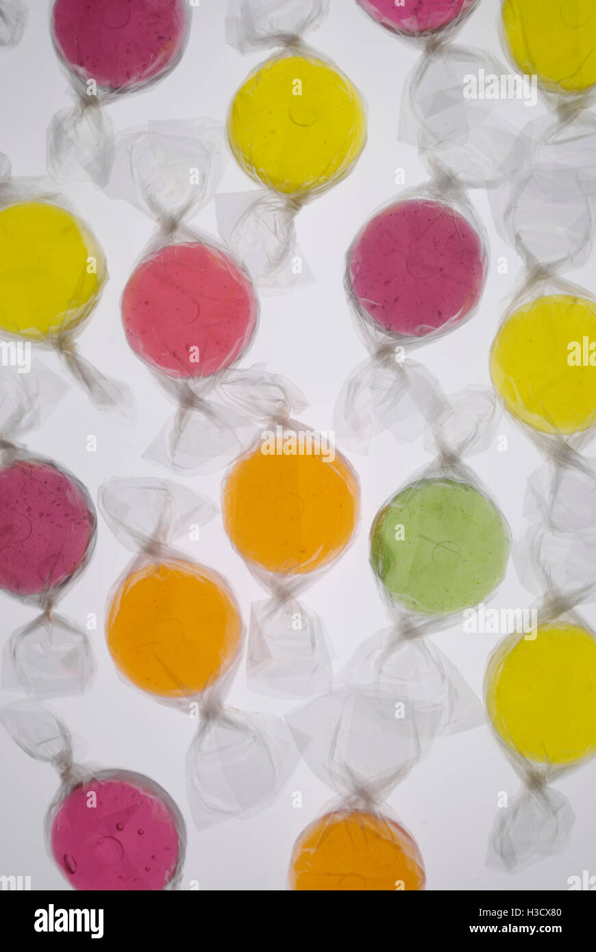 Orange candy wrappers hi-res stock photography and images - Alamy