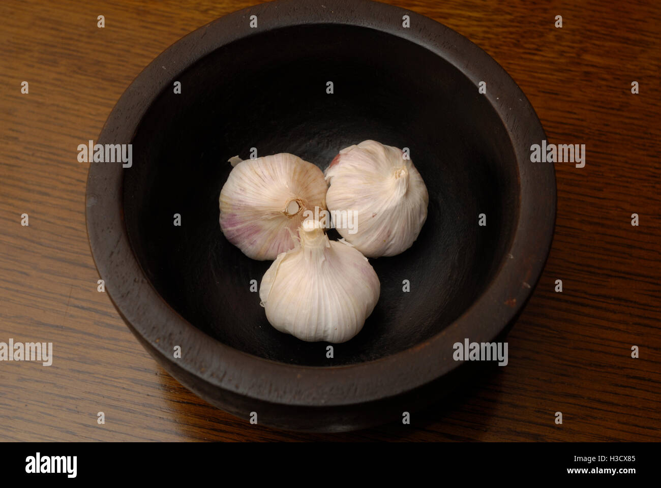 Cloves of Garlic in Wooden Bowl Stock Photo Alamy