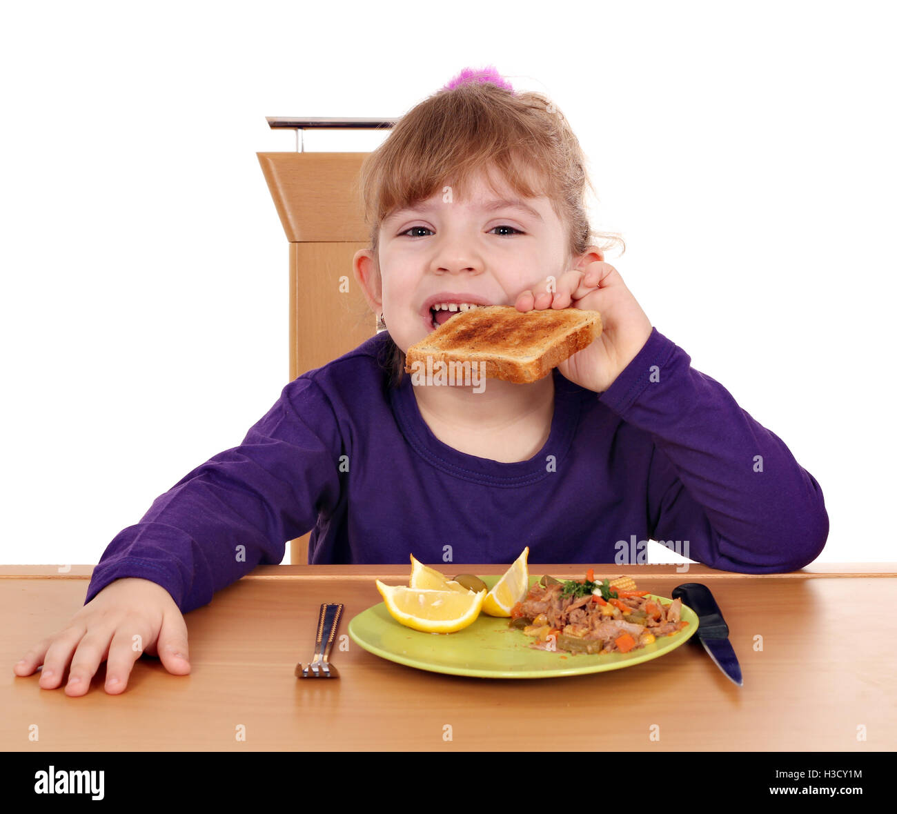 little girl eat toast bread and tuna fish for breakfast Stock Photo Alamy