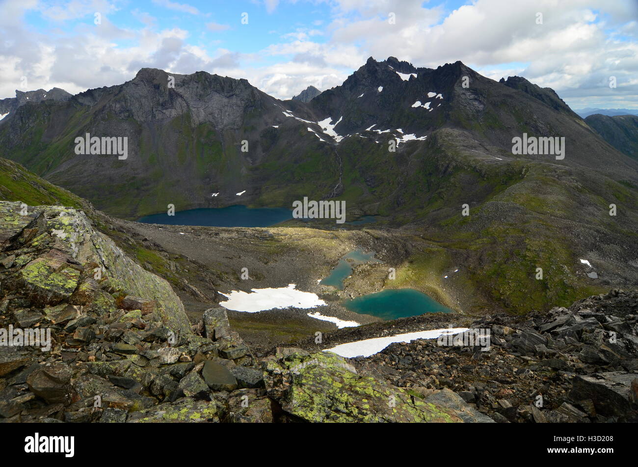 Mountain lakes under the Slogen mountain, under a ray of sunshine Stock Photo