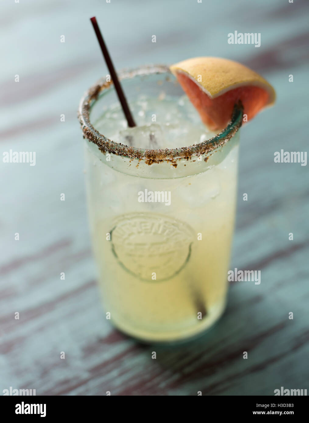 Close-up of drink served on wooden table Stock Photo