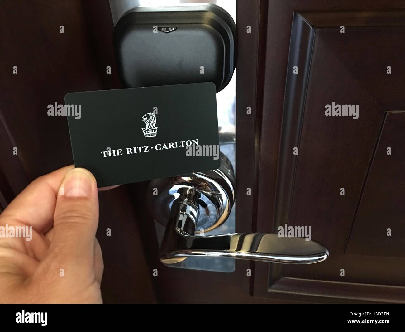 Using my door key card to enter my hotel room at the Ritz Carlton in Budapest, Hungary. Stock Photo