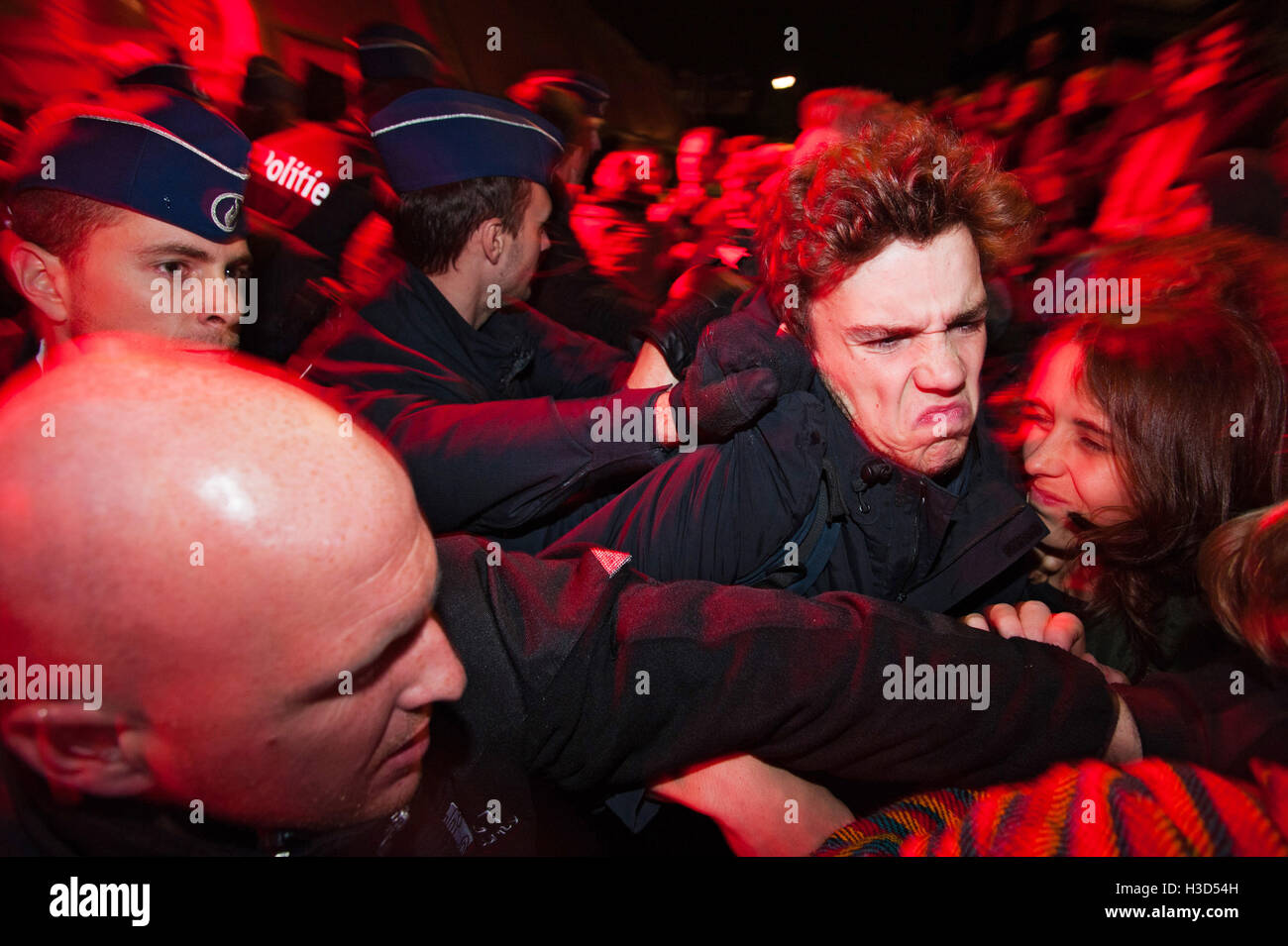 Ghent, Belgium. 06th Oct, 2016. Protesters try to enter a private party in Ghent of the real estate company MG Real Estate because they feel it unrightfully occupies public space. © Frederik Sadones/Pacific Press/Alamy Live News Stock Photo
