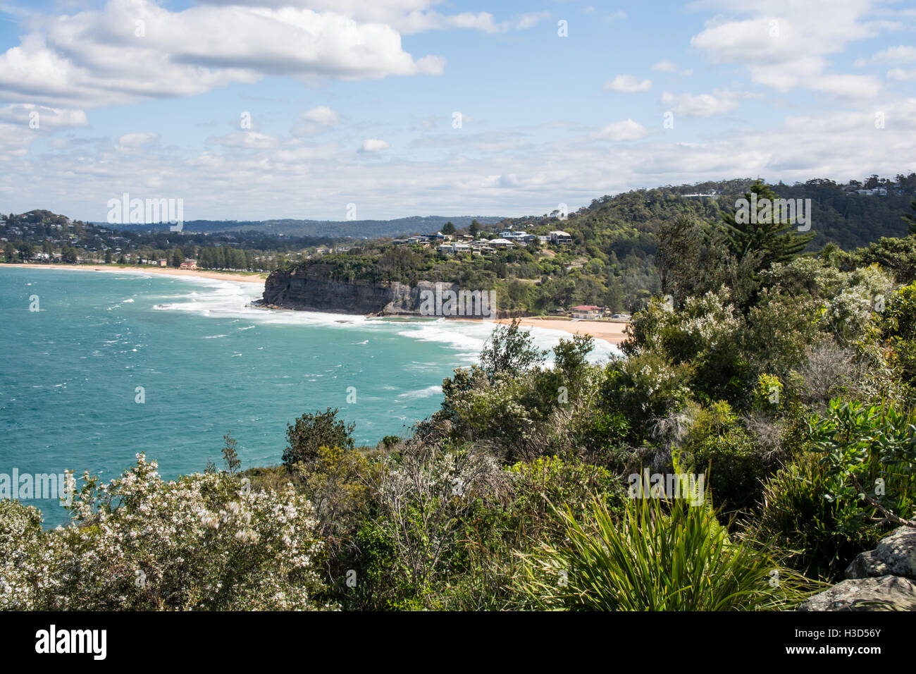 Looking South from North Bilgola Head with Bilgola Beach on the right and Newport Beach in middle distance. Stock Photo